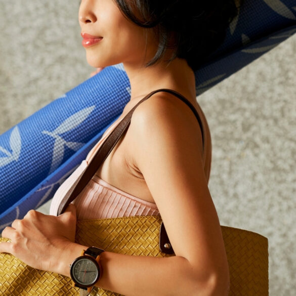 Woman Carrying Bag and Yoga Mat