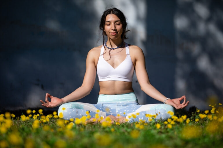 Yoga Teacher Meditating During Retreat