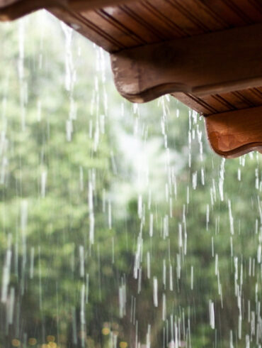 heavy rain falling on roof of yoga retreat venue