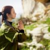 yoga teacher leading a class in spring time